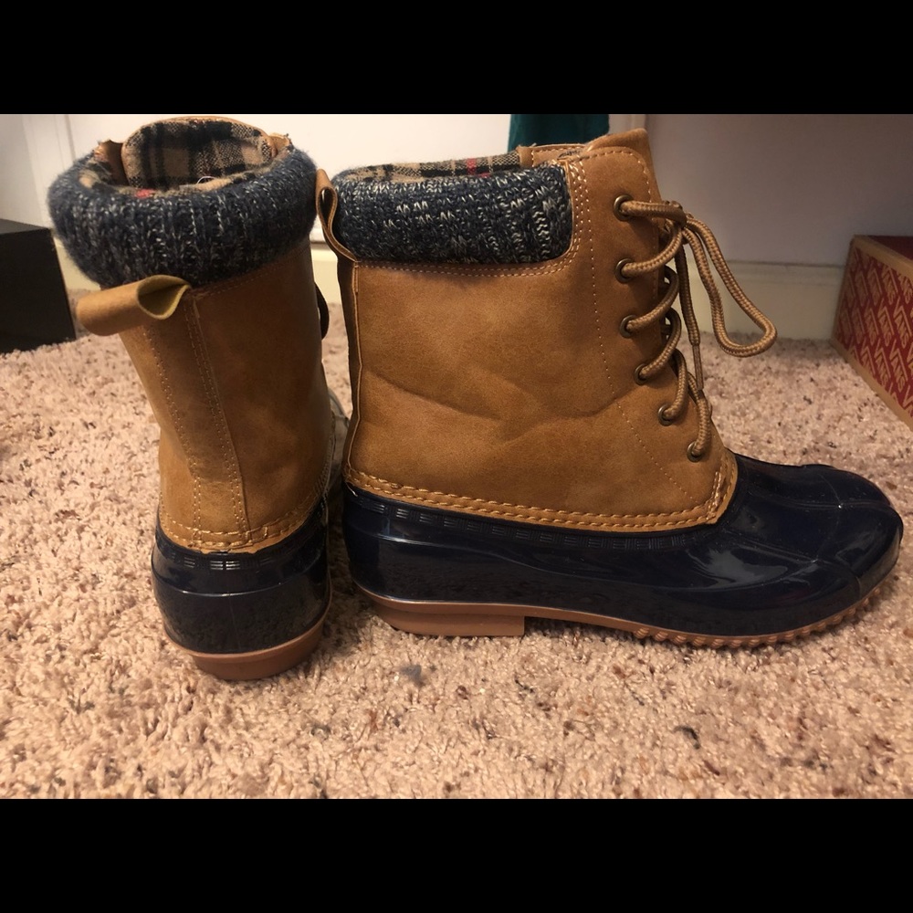 Navy Blue and Tan rain boots with plaid trimming